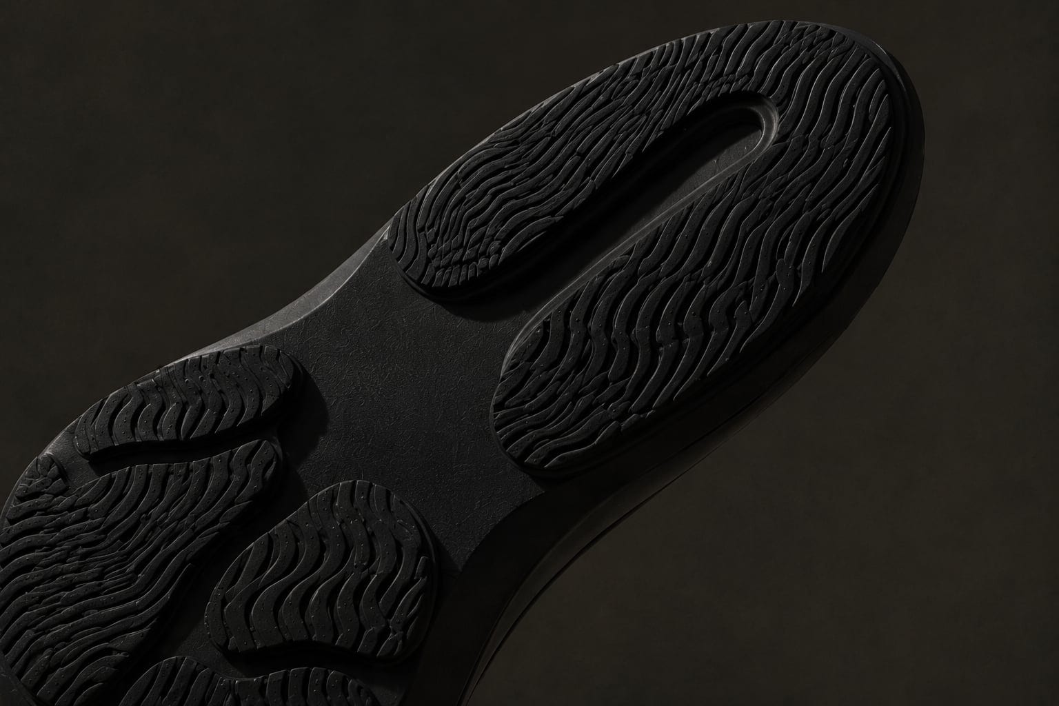 Macro of the lugged rubber outsole tread.