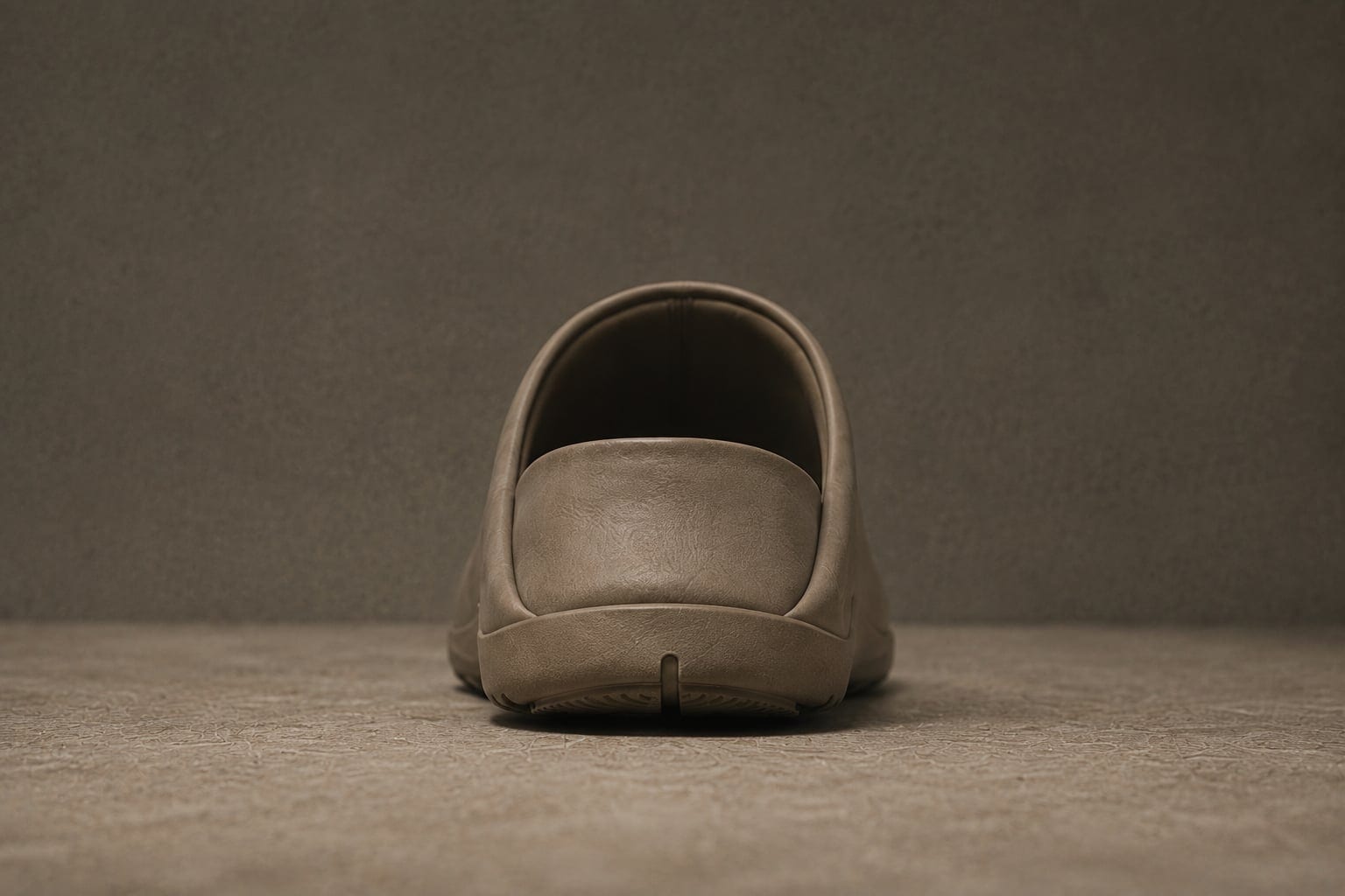 Rear view of the mule showing its flat-heel profile and open footbed.